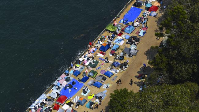 Revellers pictured at Blues Point Reserve during a previous New Year’s Eve event.