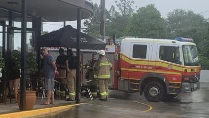 Coffee shop evacuated as fire breaks out during downpour