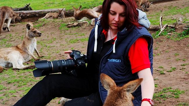 Alex with some rather adorable kangaroos.