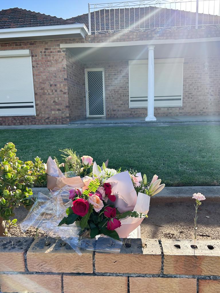 Flowers left outside the Findon home of alleged murder victim Maria Dimasi. Picture: Zayda Dollie