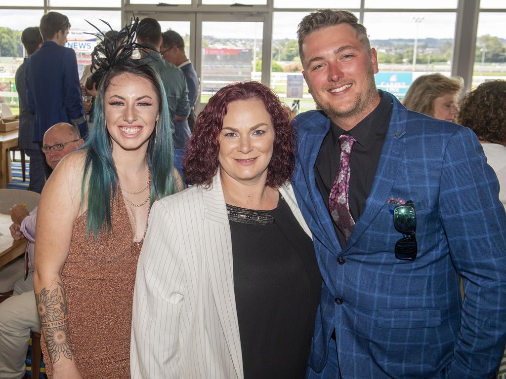 (from left) Georgia Welke, Tessa Kajewski and Thomas Leslie. Melbourne Cup Day at the Toowoomba Turf Club. Tuesday, November 1, 2022. Picture: Nev Madsen.