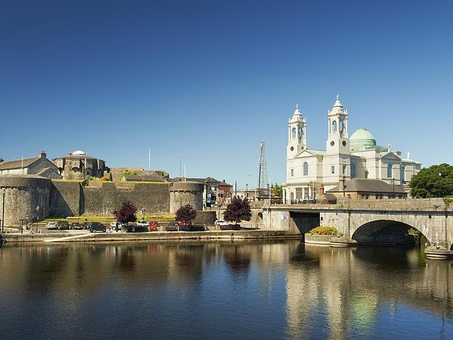 Church and Athlone Castle on the Shannon River, featured in the Lonely Planet guide to Ireland.