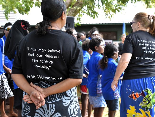 Yirrkala School staff wore shirts displaying the heartfelt quote from Mr W Wunungmurra. It was also visible in a bright mural. Picture: Sierra Haigh