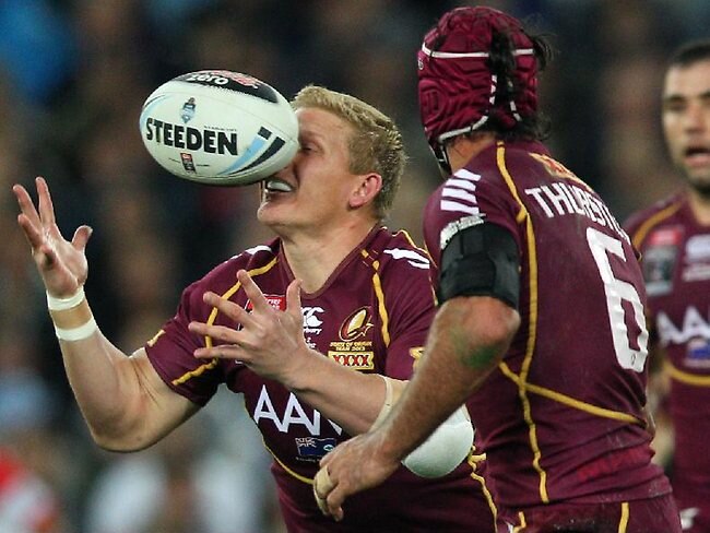 State of Origin II, 2012: Queensland prop Ben Hannant juggles the ball. Picture: Brett Costello