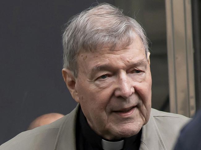 FILE - In this Feb. 26, 2019, file photo, Cardinal George Pell arrives at the County Court in Melbourne, Australia. A newspaper reports that Pell has been transferred from a Melbourne prison after a drone illegally flew overhead in a suspected attempt to photograph the famous inmate. (AP Photo/Andy Brownbill, File)