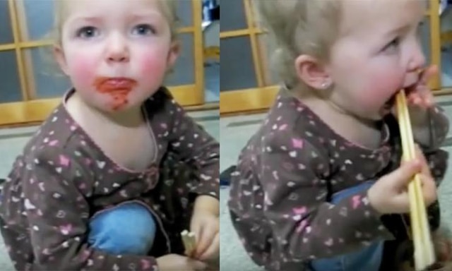 2 year old is determined to eat entire jar of spicy kimchi (with chopsticks)