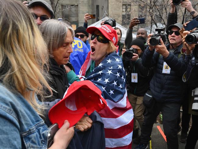 Pro and anti Trump supporters face off during a protest outside of Manhattan Criminal Court in New York. Picture: AFP