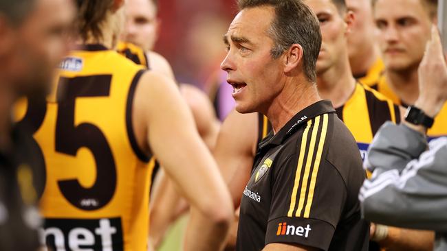 SYDNEY, AUSTRALIA – JULY 19: Hawks head coach Alastair Clarkson speaks to his team a three quarter time during the round 7 AFL match between the Hawthorn Hawks and the Melbourne Demons at GIANTS Stadium on July 19, 2020 in Sydney, Australia. (Photo by Mark Kolbe/AFL Photos/via Getty Images)