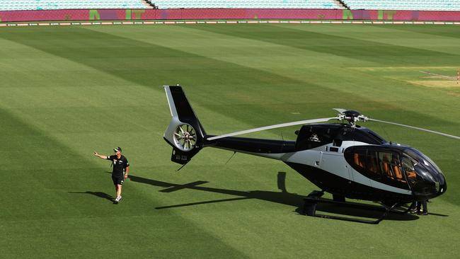 David Warner of the Thunder arrives on the field of the Sydney Cricket Ground by helicopter. Photo by Matt King/Getty Images