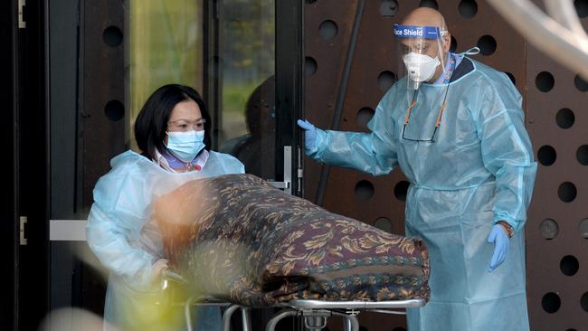 A body is removed from Epping Gardens Aged Care. Picture: NCA NewsWire/Andrew Henshaw