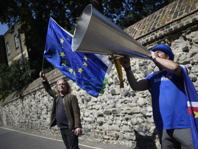 LONDON, ENGLAND - JULY 23: Anti-Brexit campaigner Steve Bray protests outside the campaign office of new Conservative Party leader Boris Johnson on July 23, 2019 in London, England. After a month of hustings, campaigning and televised debates the members of the UK's Conservative and Unionist Party have voted for Boris Johnson to be their new leader and the country's next Prime Minister, replacing Theresa May. (Photo by Peter Summers/Getty Images)