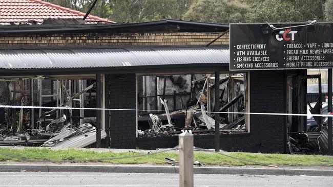 Neighbours reported hearing loud blasts before the shop went up in flames. Picture: Andrew Henshaw