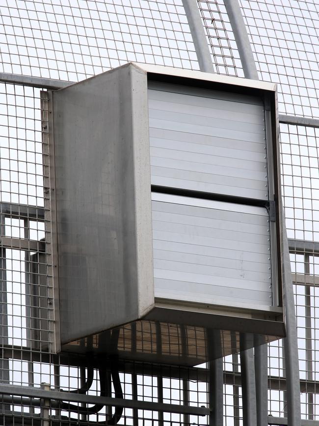 Working overtime: The camera being trialled on Clunies Ross Road overpass on the M4.