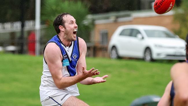 University Blues skipper Ayce Cordy takes a mark in Round 1. Picture: George Sal