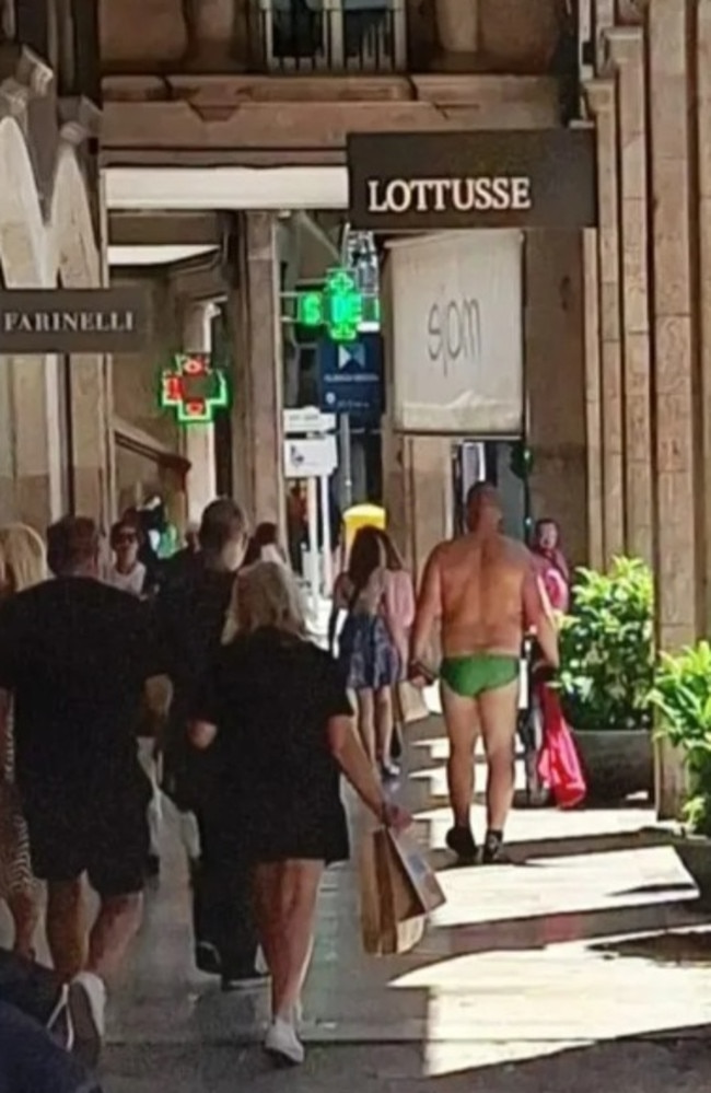 He ignored the stares from fully-dressed passers by. Picture: Majorca Daily Bulletin