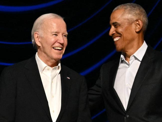 TOPSHOT - US President Joe Biden (L) stands with former US President Barack Obama onstage during a campaign fundraiser at the Peacock Theater in Los Angeles on June 15, 2024. (Photo by Mandel NGAN / AFP)