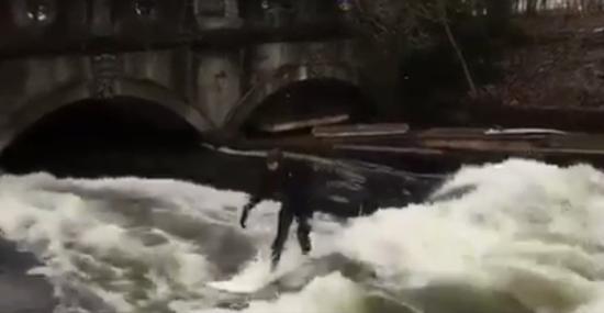 Munich Surfer Rides Waves Despite Almost Freezing Temperatures. Credit - Ruth Corrigan via Storyful