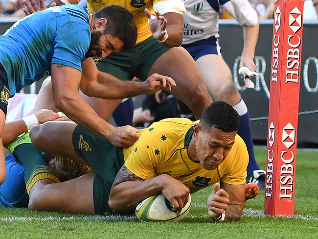 Israel Folau of the Australian Wallabies scores a try during the Test match between the Australian Wallabies and the Italian Azzurri at Suncorp Stadium in Brisbane, Saturday, June 24, 2017. (AAP Image/Dan Peled) NO ARCHIVING, EDITORIAL USE ONLY