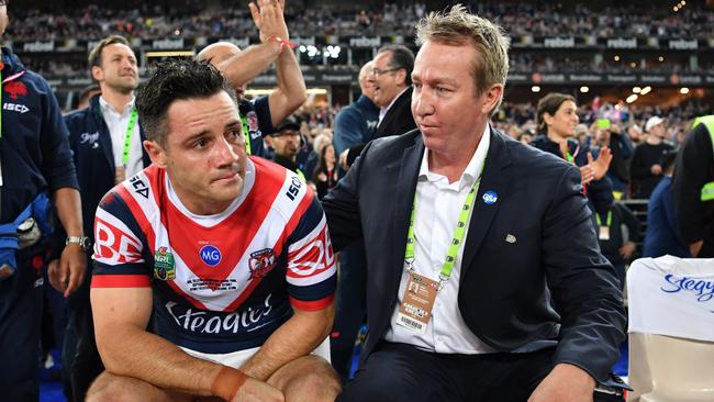 Robinson with star Cooper Cronk after the Roosters won the 2018 NRL Grand Final. Picture: NRL