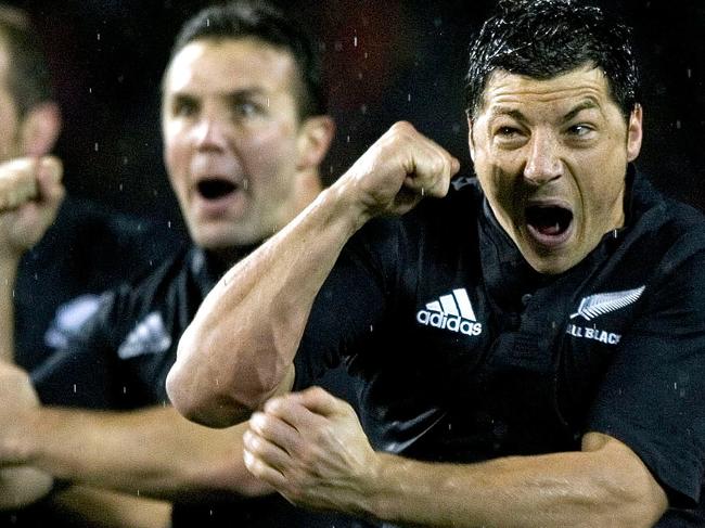 TO GO WITH AFP STORY BY CHRIS FOLEY (FILES) In a file picture taken July 21, 2007 All Black's Byron Kelleher (R) and his teammates preform the haka before the Tri-Nations rugby international between New Zealand and Australia at Eden Park. New Zealand's pre-match haka may be one of sports most famous rituals and often claimed to intimidate opposing sides, but now its benefits to the All Blacks are being questioned. AFP PHOTO / BRENDON O'HAGAN