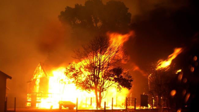 A house and property go up in flames at Kinglake, Victoria, in 2009.