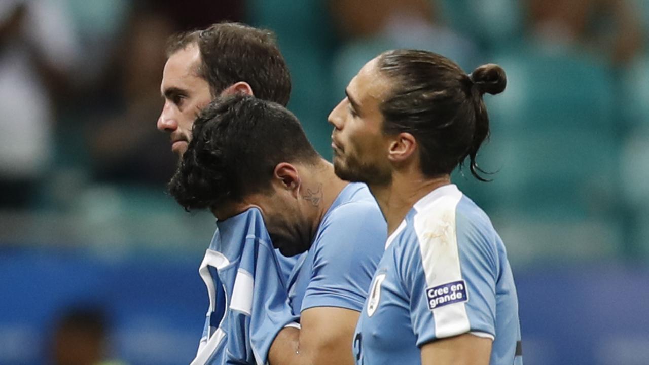 Uruguay's Luis Suarez cries after Uruguay were eliminated by Peru.