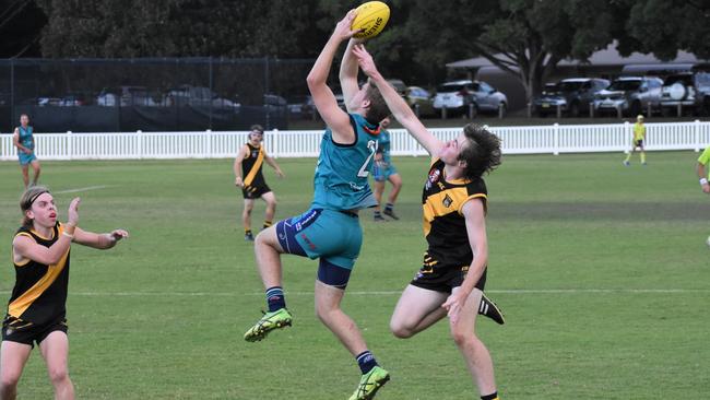 Hayden Proctor takes a strong mark for the Coffs Breakers in the tight tussle against Grafton. Photo: Green Shoots Marketing.