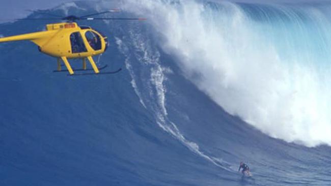 Cheyne Horan in giant surf at an outer reef off Maui in 2002