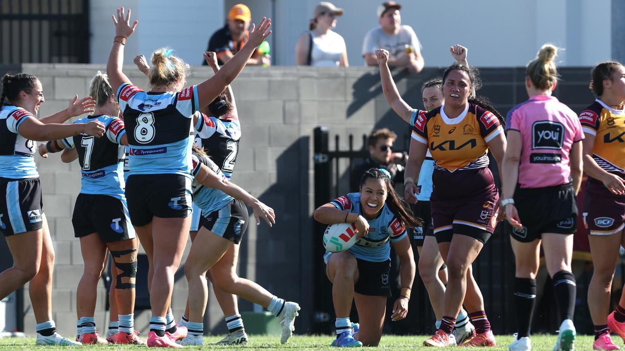 BRISBANE, AUSTRALIA - SEPTEMBER 29: Cronulla Sharks players celebrate their win over Broncos during the NRLW Semi Final match between Brisbane Broncos and Cronulla Sharks at Totally Workwear Stadium on September 29, 2024 in Brisbane, Australia. (Photo by Regi Varghese/Getty Images)