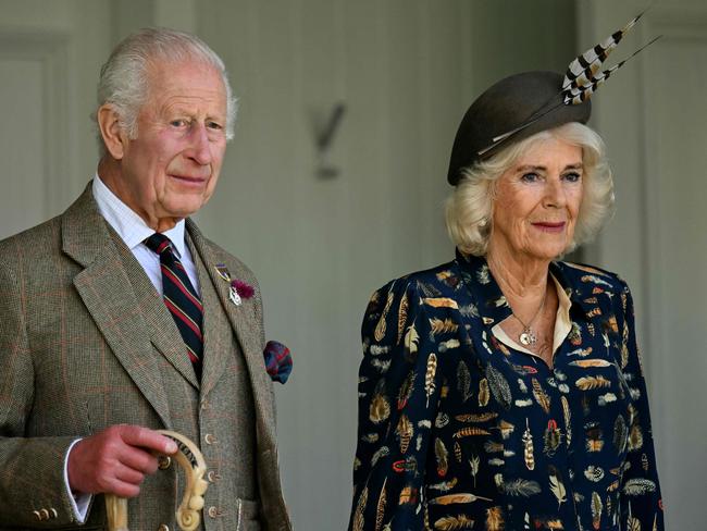 Britain's King Charles III and Britain's Queen Camilla attend the annual Braemar Gathering in Braemar, central Scotland, on September 7, 2024. The Braemar Gathering is a traditional Scottish Highland Games which predates the 1745 Uprising, and since 1848 it has been regularly attended by the reigning Monarch and members of the Royal Family. (Photo by ANDY BUCHANAN / AFP)