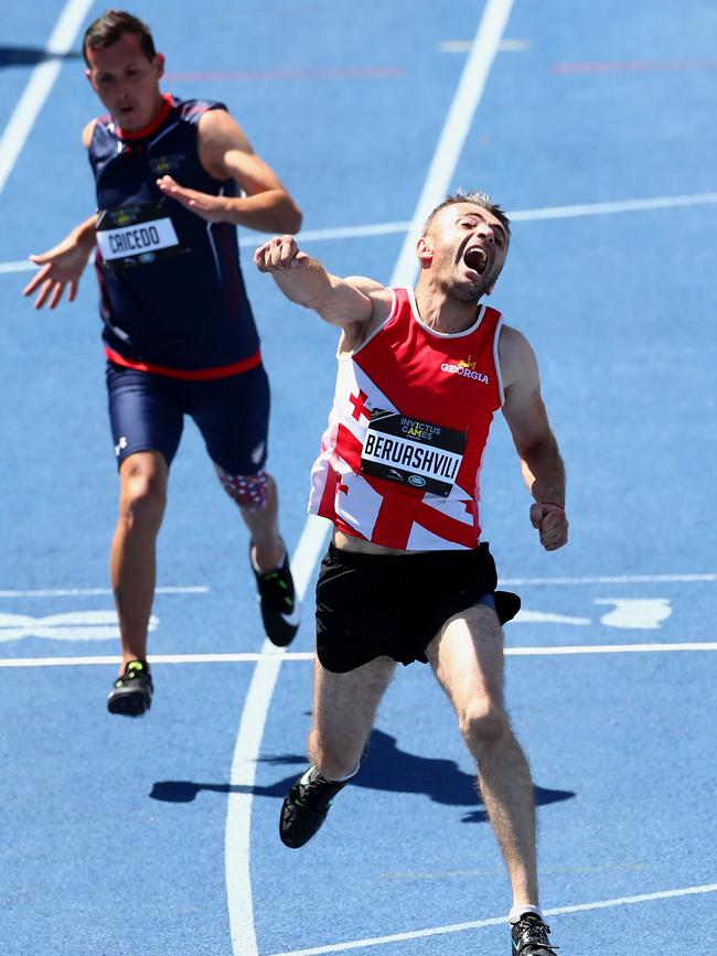 Aleksi Beruashvili of Georgia celebrates winning the Men's 100m IT7. Picture: Cameron Spencer/Getty Images for the Invictus Games Foundation