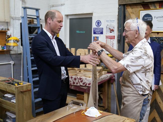 Prince William using a lathe during a visit to Faithworks Carpentry Workshop. Picture: Getty Images