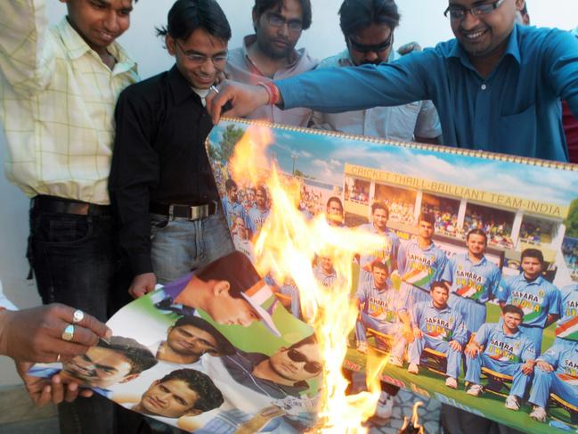 Fans burn posters of the Indian cricket team after a disappointing 2007 World Cup. Photo: AP Photo