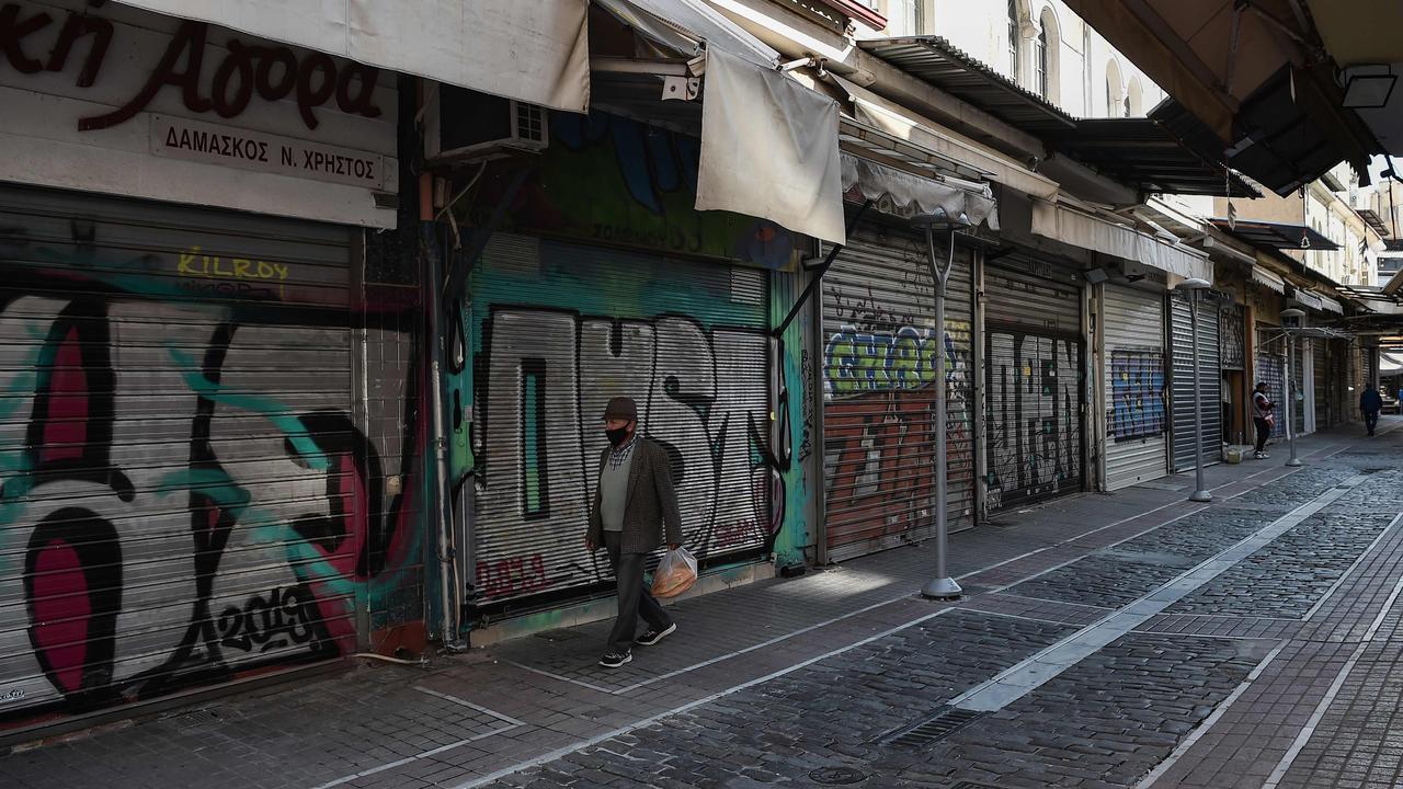 Images of shuttered stores were commonplace during Greece’s lockdown in November 2020. Picture: Sakis Mitrolidis/AFP.