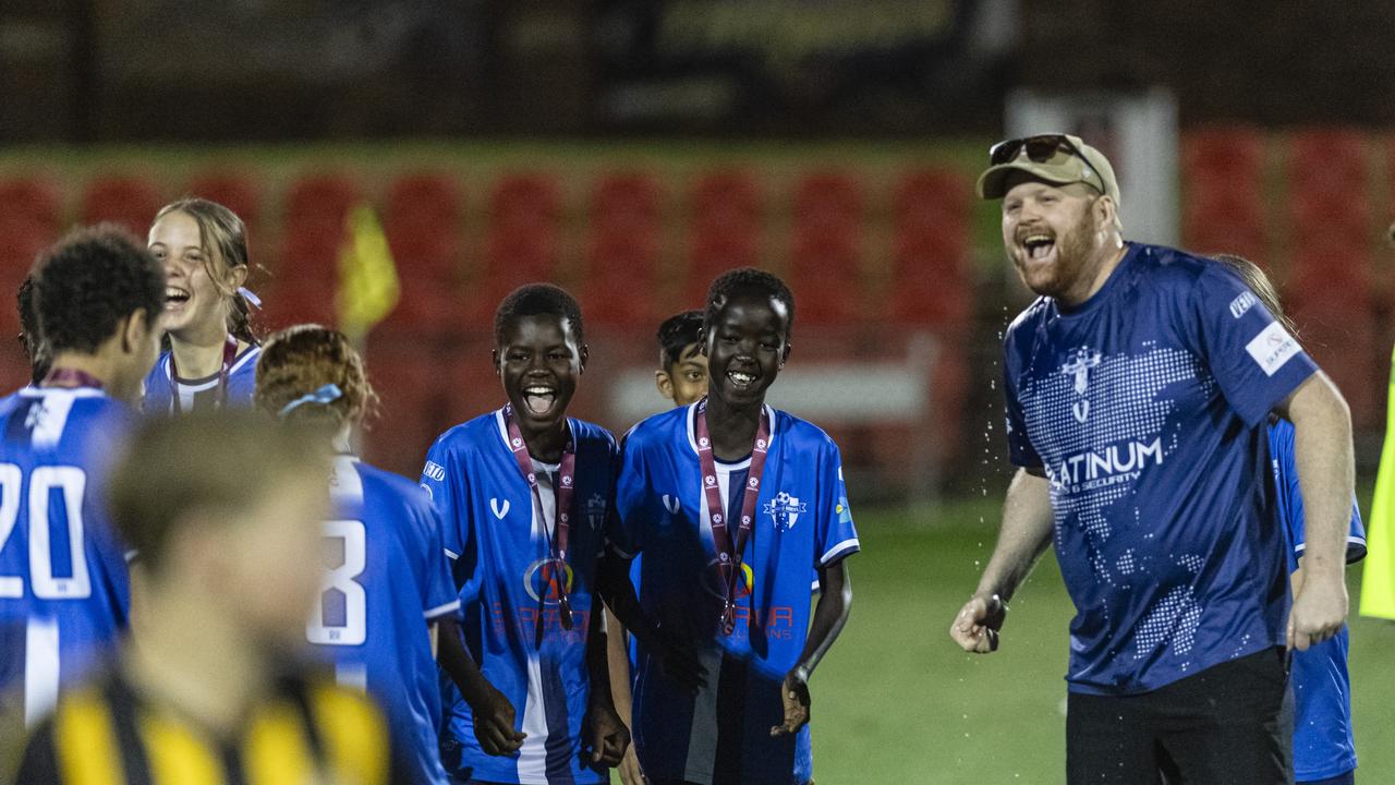 Rockville Rovers Blue celebrate the win against Football Dalby in Football Queensland Darling Downs Community Juniors U13 Div 1 White grand final at Clive Berghofer Stadium, Friday, August 30, 2024. Picture: Kevin Farmer