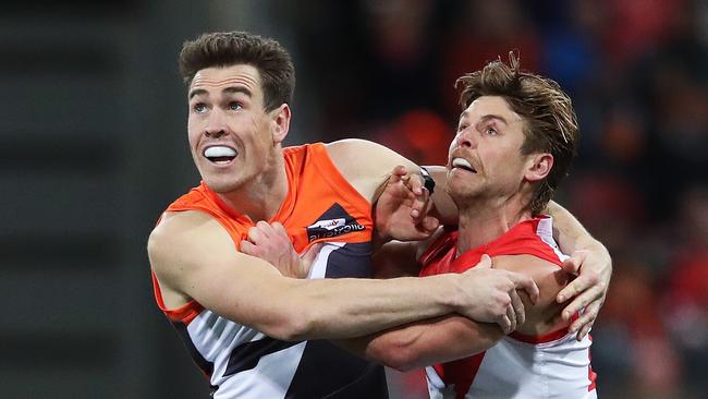 Dane Rampe locks horns with Jeremy Cameron during the Sydney derby last year. Picture. Phil Hillyard.