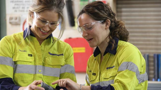 Tanami mine technical services manager Rachel Manger analyses a core sample with project geologist Ali Oswald. Picture: Gera Kazakov