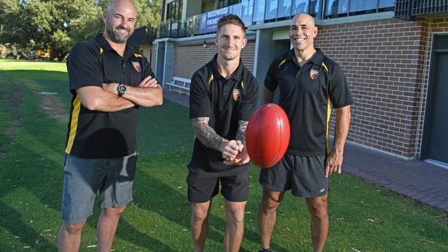 Port Adelaide AFL vice-captain Hamish Hartlett is set to be a development coach at division one Adelaide Footy League Club Goodwood Saints this year. Pictured with A grade coach Luke Donaldson (L) and under-17.5 coach Darren Loffler. Picture: Tom Huntley