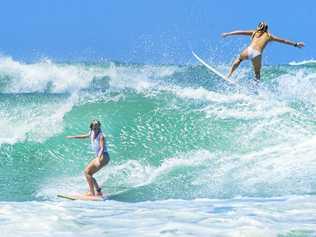 Surfers at The Bluff at Alex Heads as rough swells whipped up by Cyclone Oma hit the Sunshine Coast. Picture: Lachie Millard