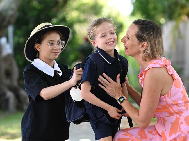 2/01/2023:  Melanie Walters with daughters Frances Hughes 4 (starting preps)and Isabella Hughes 9, arrive for the first day at school at St Margaret's Anglican Girls School in Ascot, Brisbane. pic Lyndon Mechielsen/Courier Mail