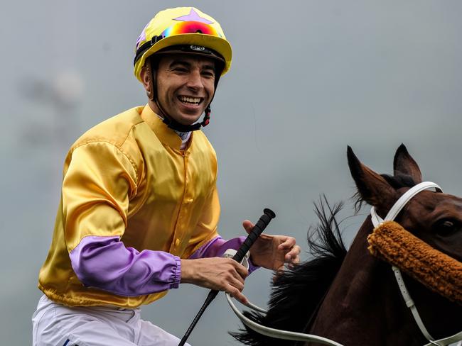 Hong Kong-based jockey João Moreira of Brazil celebrating after winning the 1200-metre Longines Hong Kong Sprint at the Hong Kong International Races. Picture: AFP Photo/Anthony Wallace