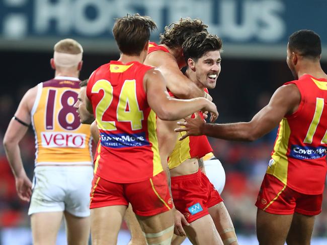 Alex Sexton of the Suns celebrates a goal during the round 22 AFL match between the Gold Coast Suns and Brisbane Lions at Metricon Stadium on August 18, 2018 in Gold Coast, Australia. Picture: Chris Hyde, Getty Images.