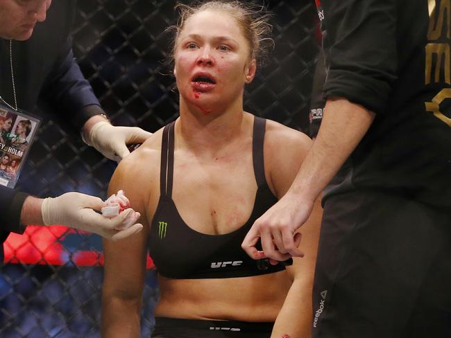 A dejected Rousey after her loss.