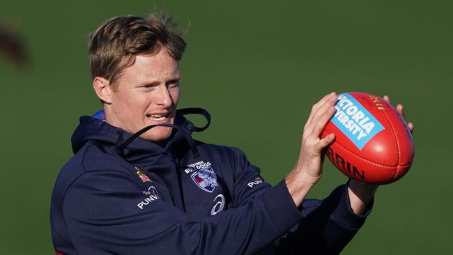 Alex Keath of the Bulldogs marks the ball during an AFL Western Bulldogs training session at Whitten Oval in Melbourne, Friday, June 5, 2020. (AAP Image/Michael Dodge) NO ARCHIVING