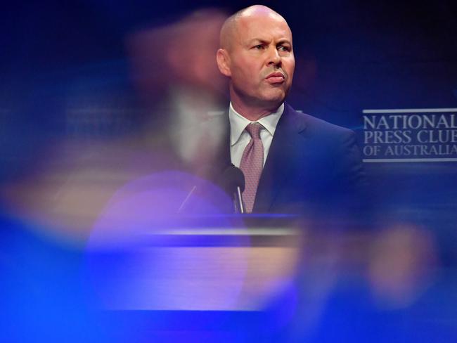 Federal Treasurer Josh Frydenberg holds a copy of the 2021-2022 Federal Budget. (Photo by Sam Mooy/Getty Images)