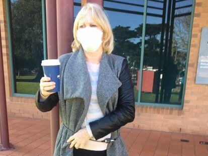 Monica Hughes has chained herself to the Mornington Police Station in protest of the State Government's coronavirus restrictions.