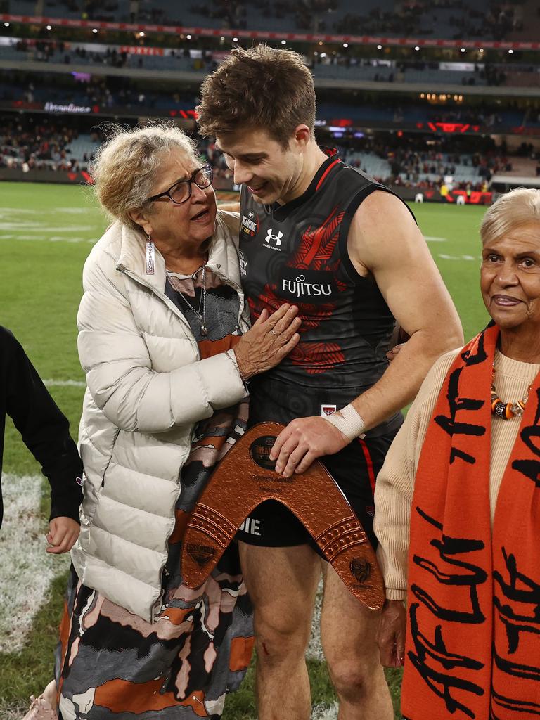 Best afield Zach Merrett of the Bombers with Aunty Joy Murphy Wandin. Pic: Michael Klein