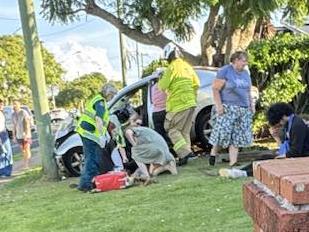 Three people have been injured after a silver Mazda hit a power pole on West St in Darling Heights on Saturday afternoon.