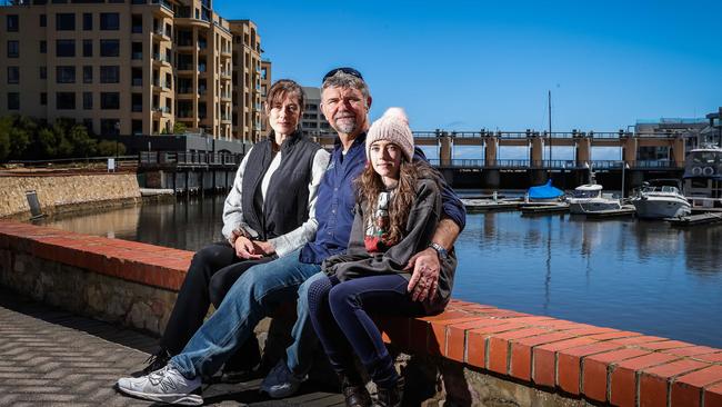 Dallas Coull, who runs See Adelaide and Beyond, with wife Nikki and daughter Tamsin. He’s urging people to get vaccinated so SA can reopen its borders. Picture: Tom Huntley