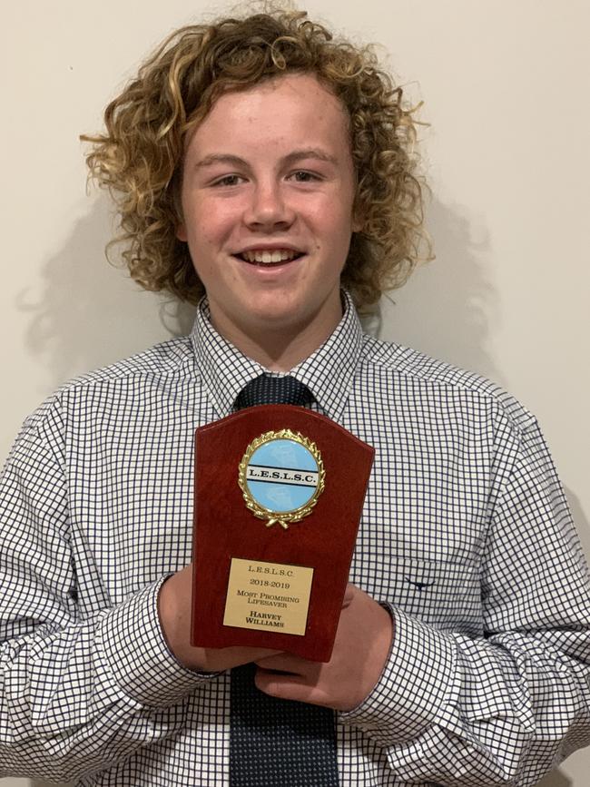 Harvey with his “most promising lifesaver” award. Picture: supplied